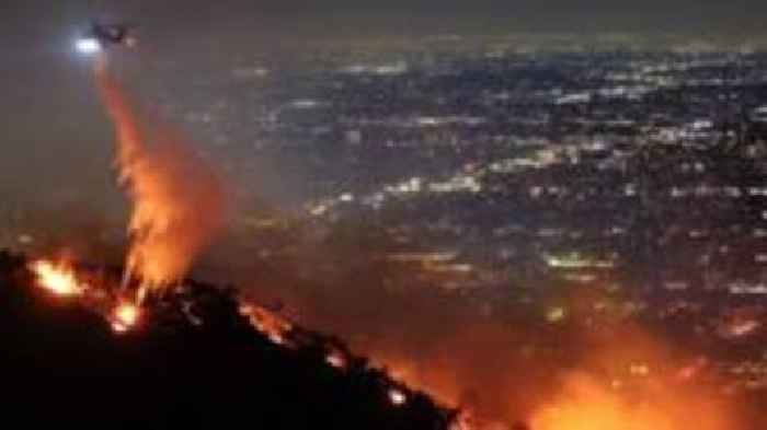 Fires reach Hollywood with fears iconic sign could be at risk