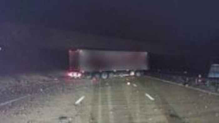 Motorway closed after lorry strikes bridge