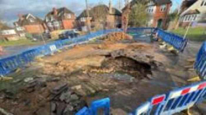 Road collapses as water pipe bursts