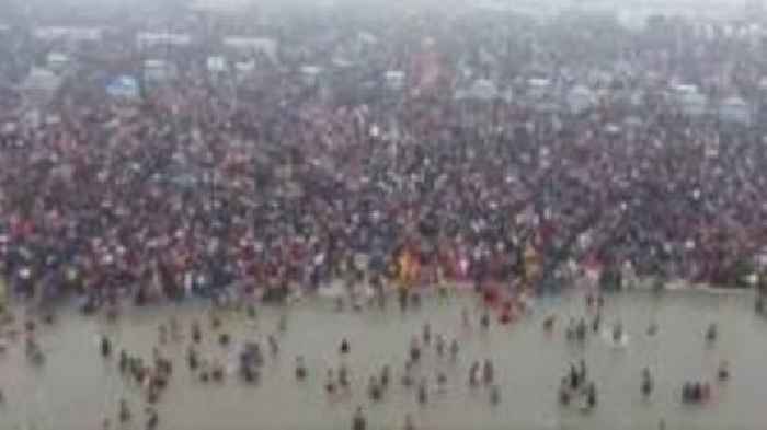 Millions perform bathing ritual on day two of India's Mahakumbh Mela