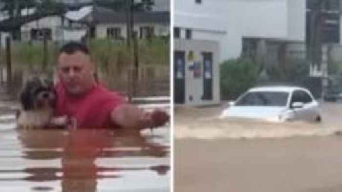 Homes and roads swamped by Brazil floodwaters