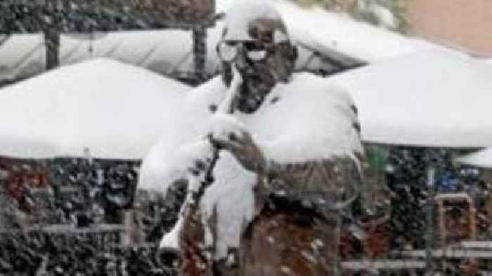 Iconic Bourbon Street in New Orleans covered in rare snow