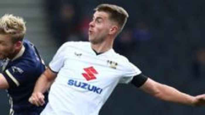 Colchester sign MK Dons defender Tucker on loan