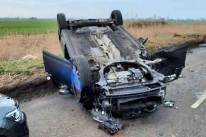 Car lands on roof after crash on Cambridgeshire road