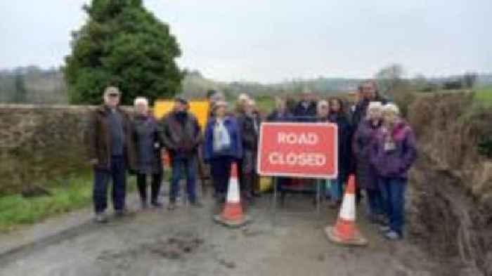 Villagers' anger as road still shut after collapse