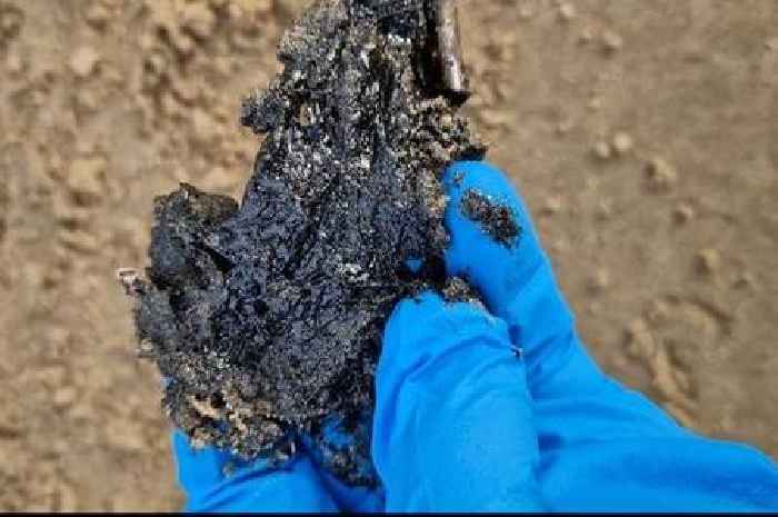 Warning to 'keep a safe distance' after mystery 'tar-like' substance washes up on Welsh beach