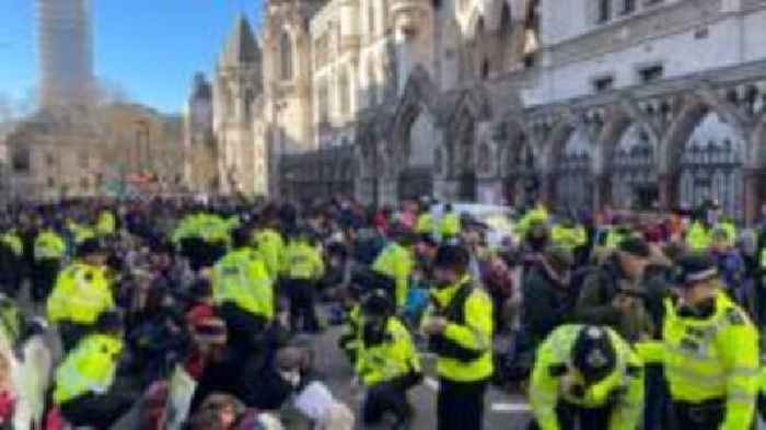 Activists block road by Royal Courts of Justice