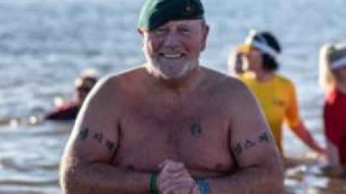 Swimmers complete 31 cold dips in memory of marine