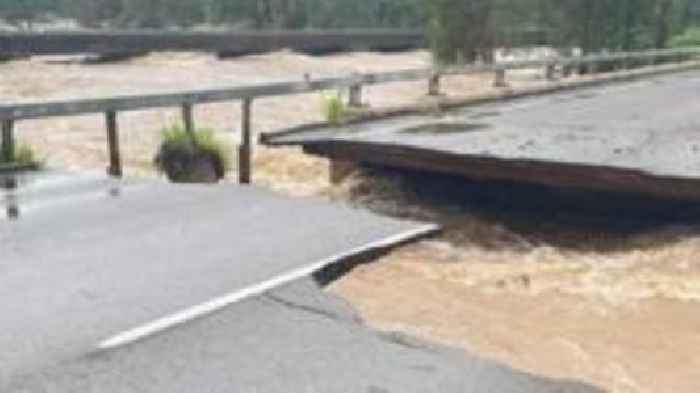 Major highway partly collapses as Australian floods worsen