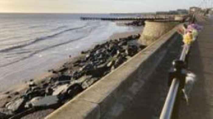 Tributes paid to woman who died on beach rocks