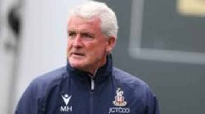 Wales legend Hughes named Carlisle head coach