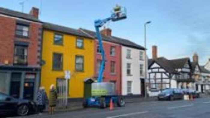 Cherry picker rescue after cat's 24 hours on roof