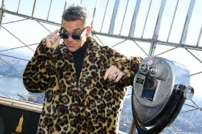 Robbie Williams 'cries like a child' after spending £20k on Eric Morecambe's glasses