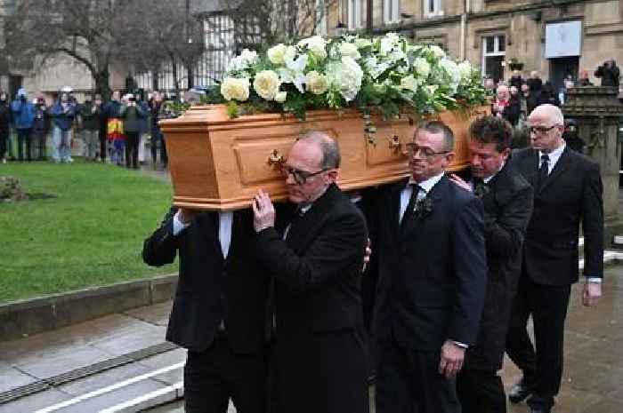 Denis Law laid to rest at moving funeral as Flower of Scotland played for hero