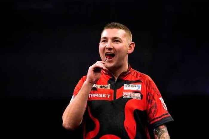 Darts ace Nathan Aspinall says Premier League rival 'wears full football kits at 34'