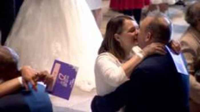 Moment 80 couples renew vows on Valentine's Day