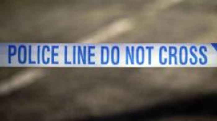 Man arrested after woman's body found