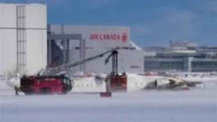 Three critically injured after plane flips at Toronto airport