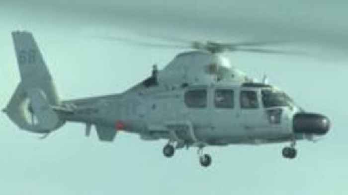 Chinese navy helicopter flies 'dangerously' close to Philippine plane