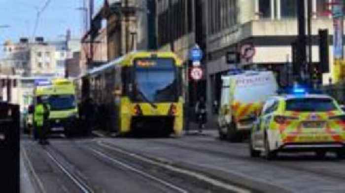 Police hunt van driver as girl dies in tram crash