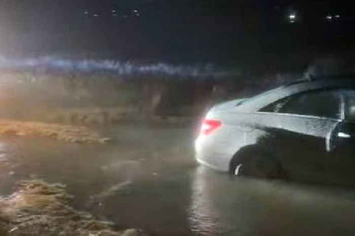 Two cars become 'well and truly stuck' on notorious Welsh beach