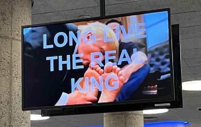 ‘THE REAL KING’: TVs at HUD Headquarters Changed to Display AI Video of Trump Kissing Elon Musk’s Feet