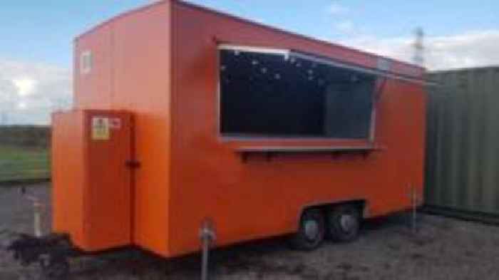 Search on for big orange food truck taken from layby