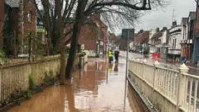 Work starts on rebuilding town's wall hit by floods