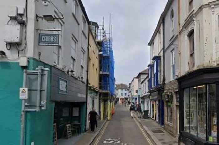 Live: Town centre road shut after 'building fire' breaks out