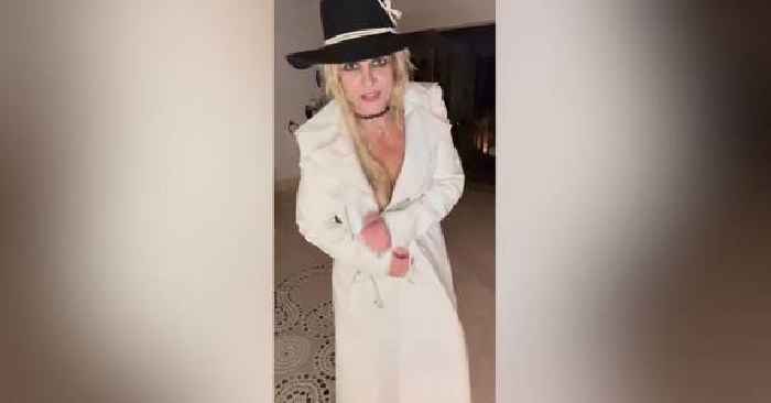 Lingerie-Clad Britney Spears Only Covers Her Body With a Trench Coat in Dancing Video: Watch