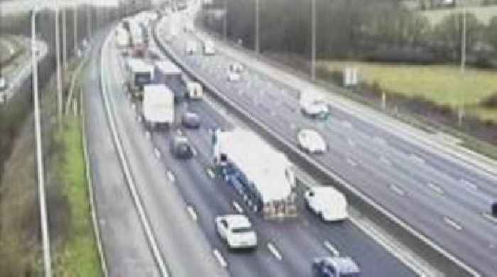 Motorway lanes blocked after lorry crash