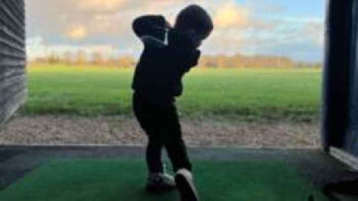 The three-year-old boy who is 'obsessed' with golf