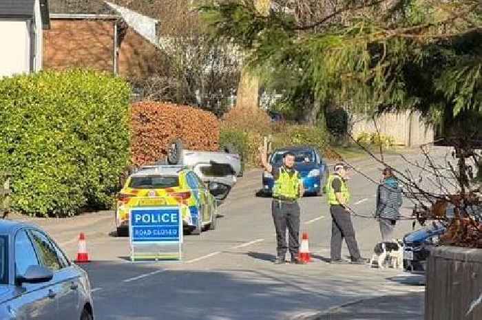 Car flips over and lands on its roof after crash in Cheltenham