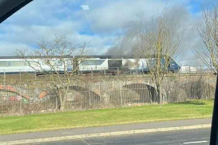 Train catches fire near busy Scots railway station as passengers evacuated