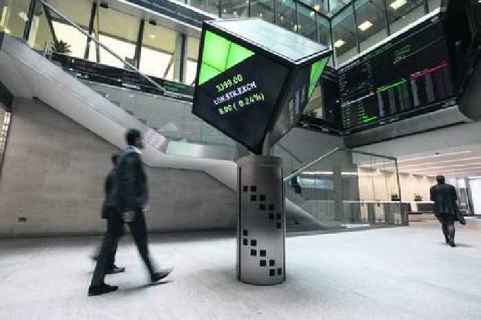 FTSE 100 hits all-time high as defence stocks soar