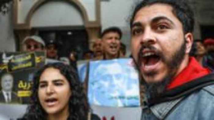 Mass trial begins of Tunisian president's opponents