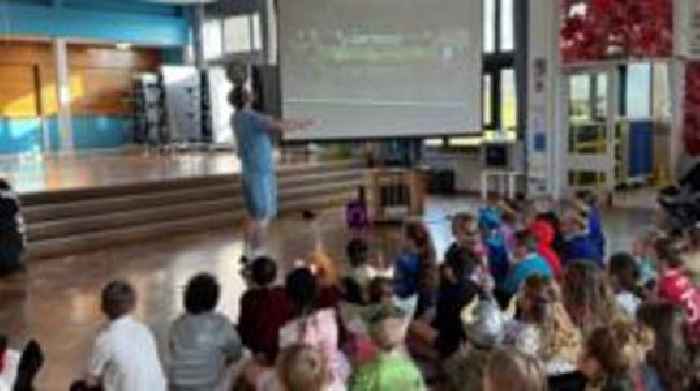 Footballer inspires pupils on World Book Day