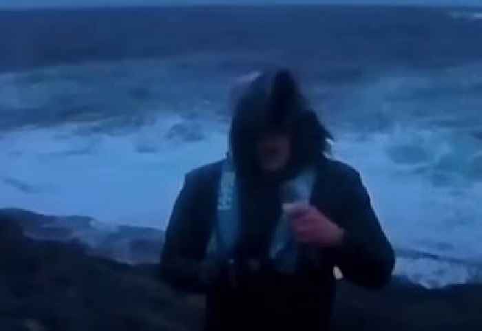 Weatherman Reporting on Storm Gets Hit by Flying Fish