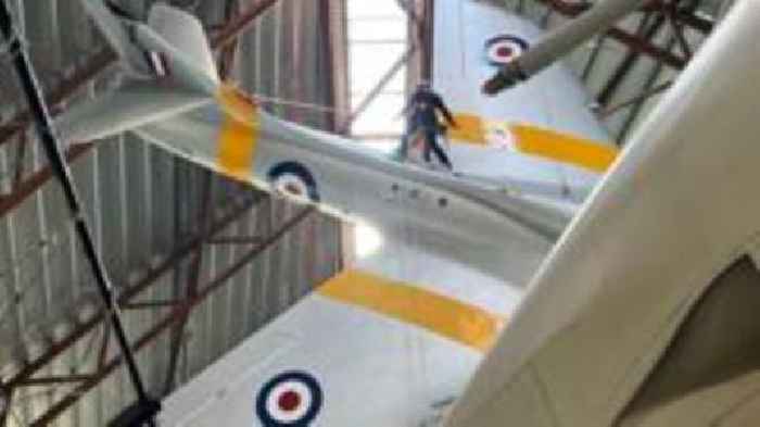 The abseiling cleaners who dust off old RAF planes