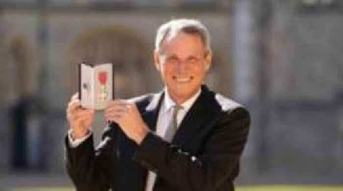Former Scotland defender Hansen receives MBE