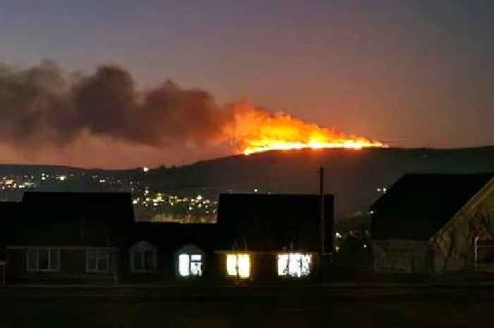 Huge mountain fire seen for miles as emergency services rush to scene