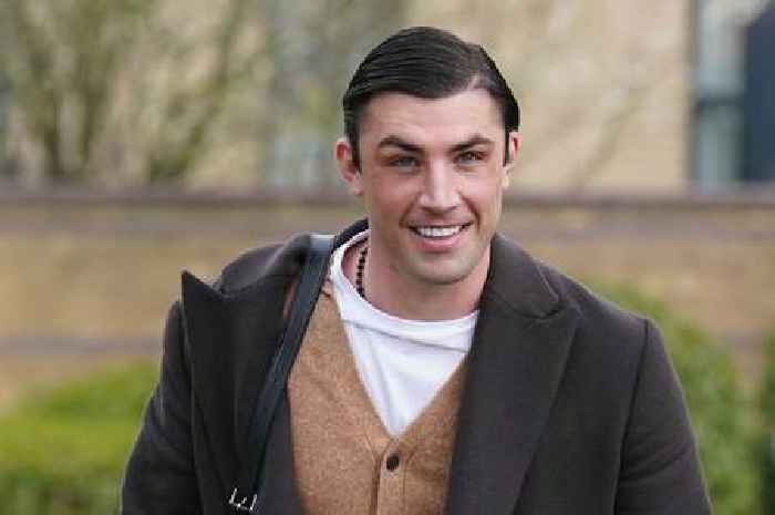 Love Island star Jack Fincham smiles to cameras as he avoids prison after dog attack
