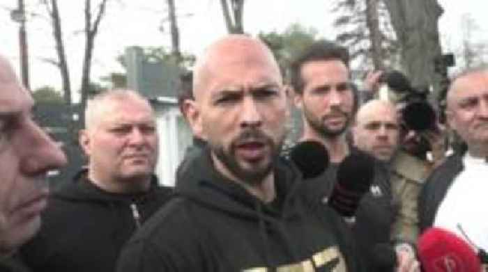 Tate brothers report to Romania police after return from US