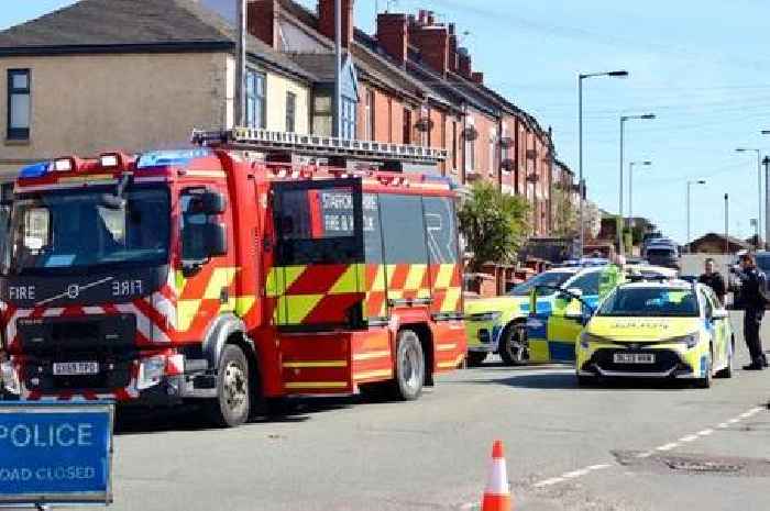 Car smashes into building as fire crews and police shut North Staffordshire road