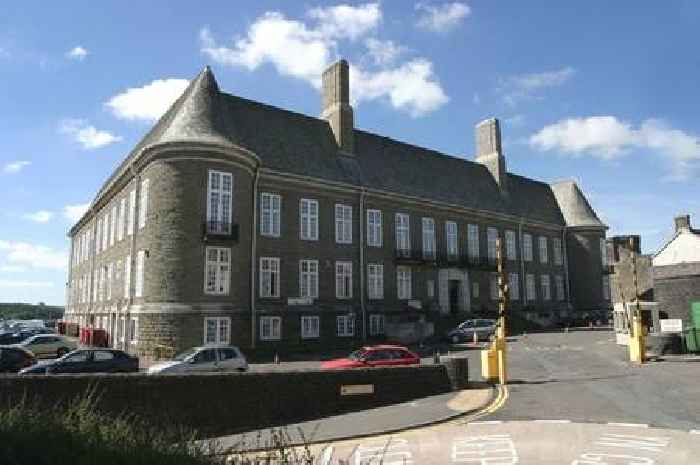 Carmarthenshire council is overspending by millions of pounds but the figure is coming down