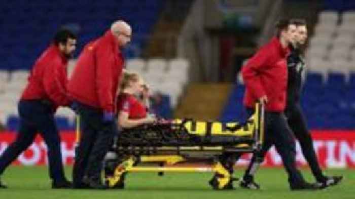 Holland to be assessed in hospital after leaving field on stretcher