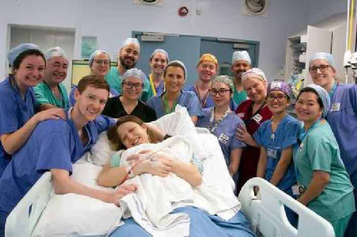 Woman born with rare condition becomes first in UK to have baby after womb transplant from sister