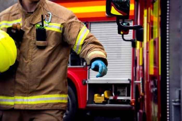 Eleven injured as blaze rips through block of flats - 60 firefighters on scene