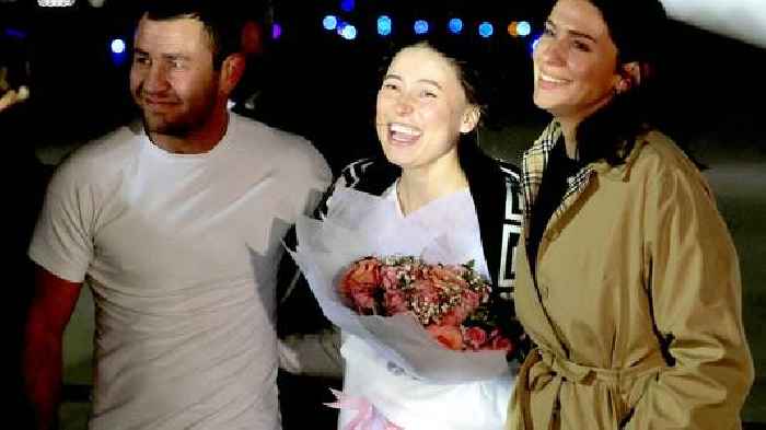 Hugs and smiles as jailed ballerina arrives home after Russia 'nightmare'