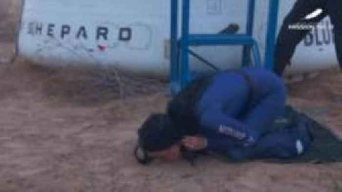 Katy Perry kisses the ground as Blue Origin crew return to land